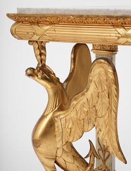 A Swedish Empire gilt wood and white marbel console table.