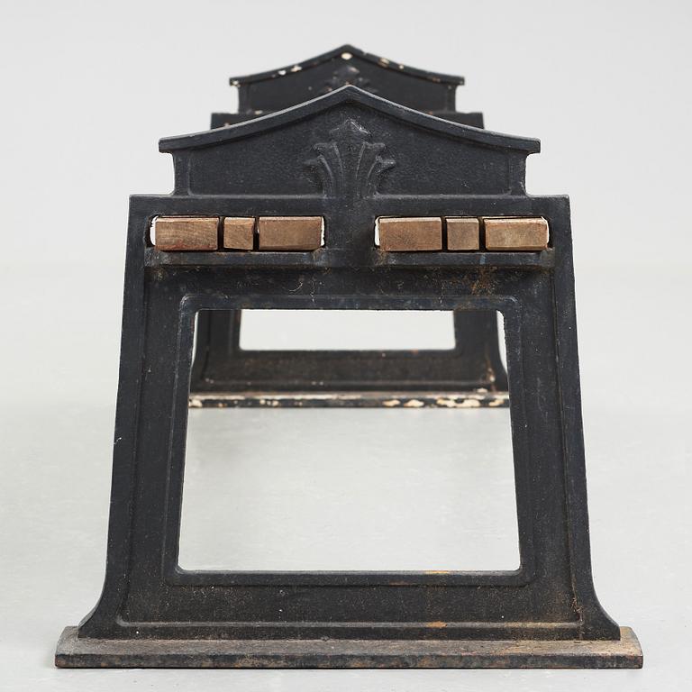 SWEDISH GRACE, a cast iron bench, 1920's-30's.