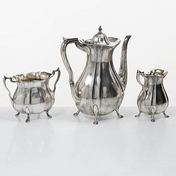 Guldsmedsaktiebolaget (GAB), A Swedish Rococo style silver coffee pot, cream jug and sugar bowl, mark of GAB, Stockholm 1918-1919.