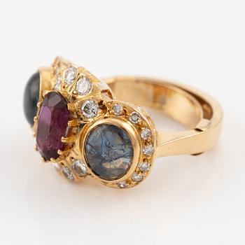 Ring, Evert Lindberg, 18K gold, set with star sapphires and rubies, as well as brilliant-cut and octagonal-cut diamonds.