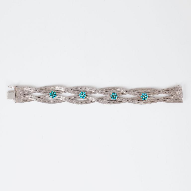 A turquoise and white gold bracelet.