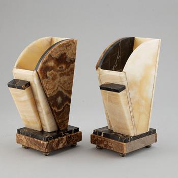 A three piece clock garniture, Art Deco style, 20th Century.