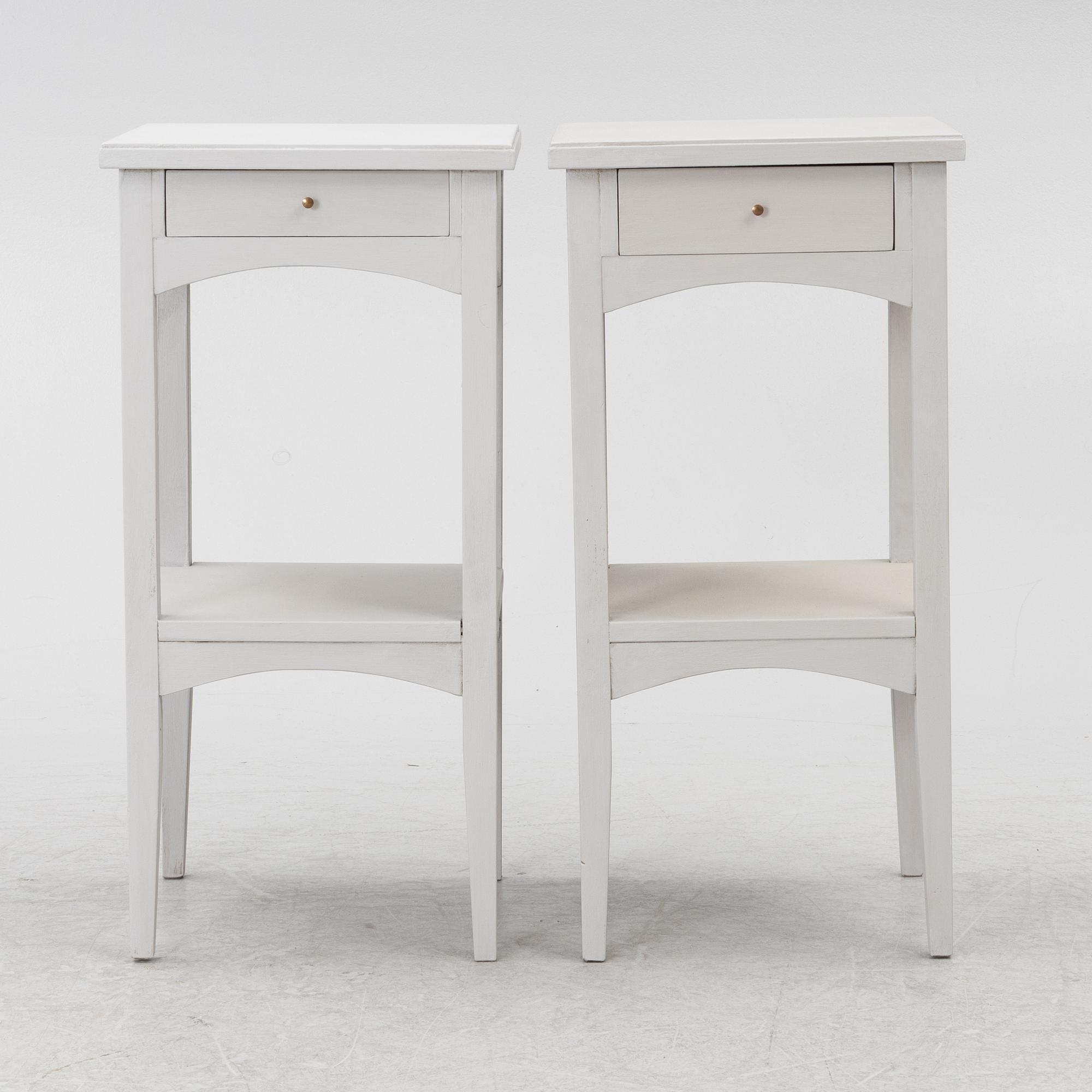 A pair of night stands, circa 1900.