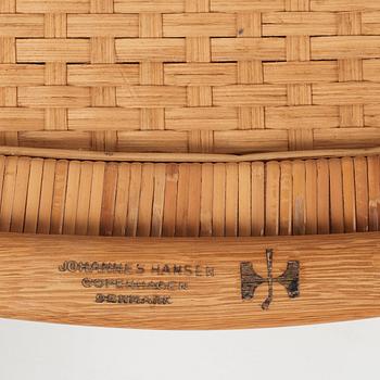 Hans J. Wegner, a pair oak and rattan "model 512" folding chairs by Johannes Hansen, Denmark 1950-60's.