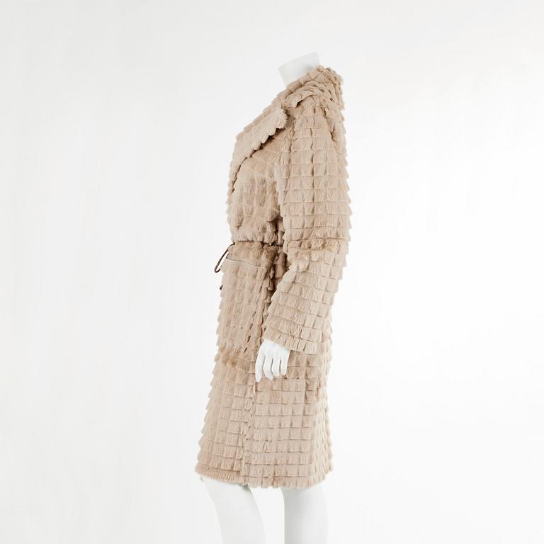 BROR AXEL PETERSEN, a beige rabbitfur coat. Size M.