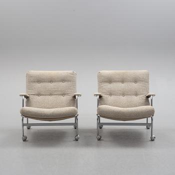 A pair of 'Karin' easy chairs by Bruno Mathsson for Dux, second half of the 20th century.
