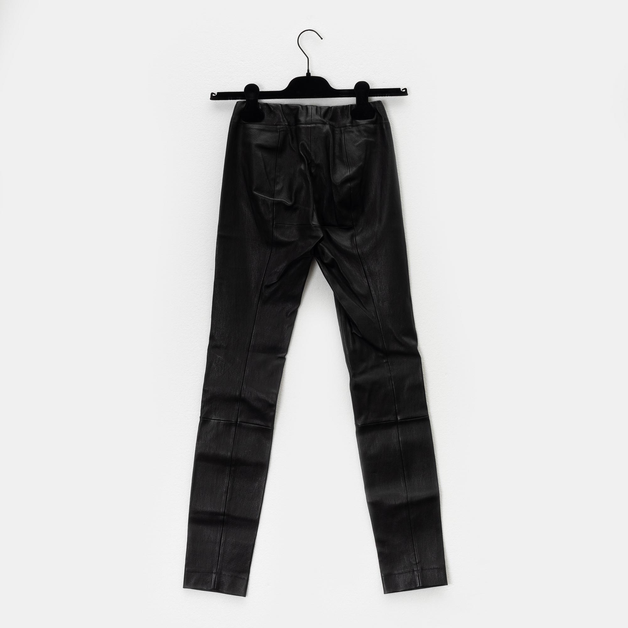 The Row, a pair of leather pants, size XS.
