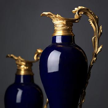 A pair of gilt bronze mounted vases, Qing dynasty, Qianlong (1736-95). French bronze mounts.