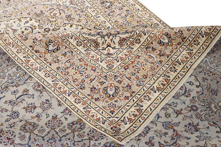 A Keshan carpet, c. 355 x 240 cm.