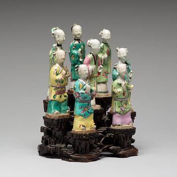 A group of eight famille rose figurines, Qing dynasty, 19th Century.