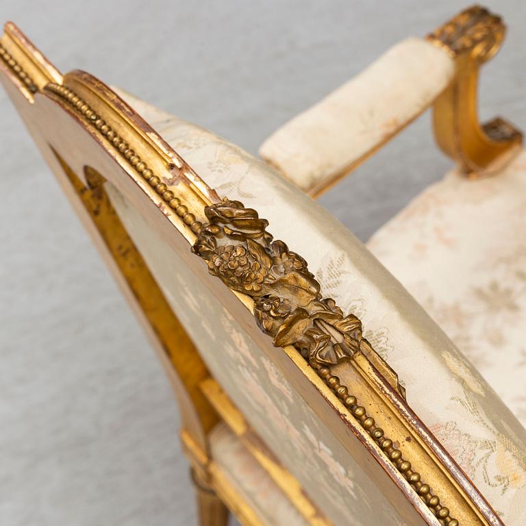 A late 19th century Louis XVI-style armchair.