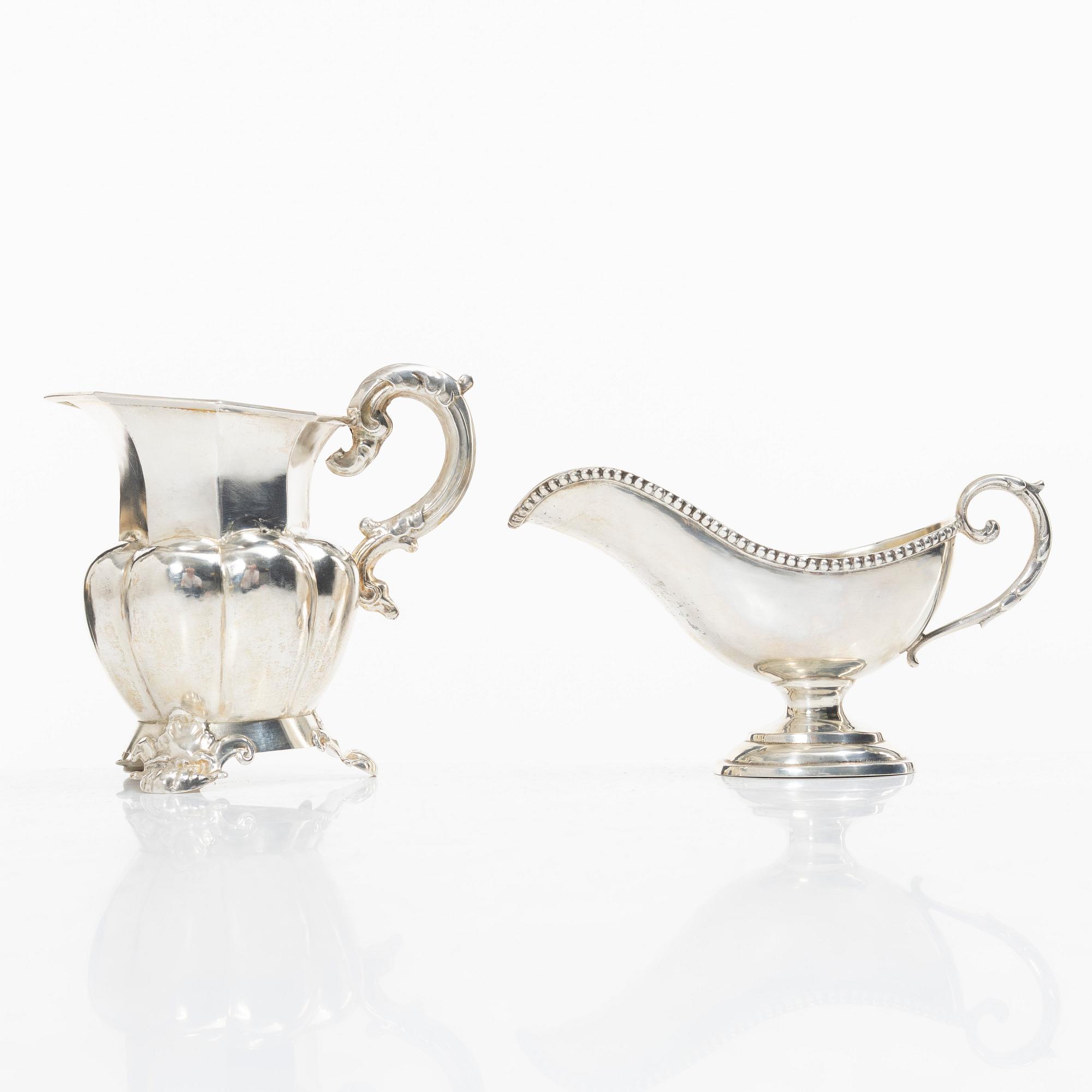 A silver gravy boat, Germany, and a silver creamer, johan Petter Tullgren, Sweden, 1857.