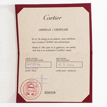 Cartier, an 18K white gold 'Love' ring with three brilliant-cut diamonds.