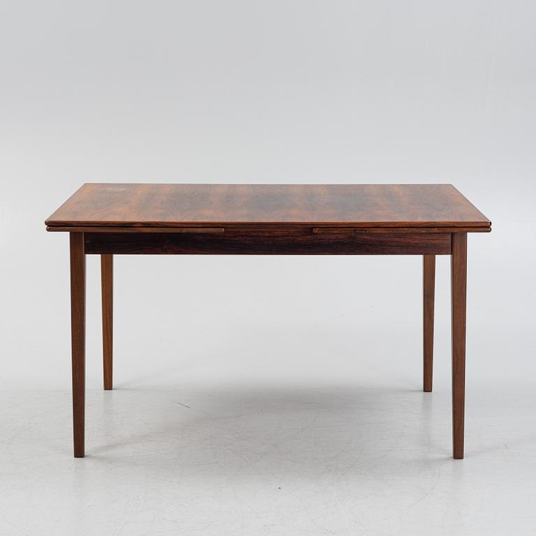 A rosewood veneered dining table, 1960's/70's.