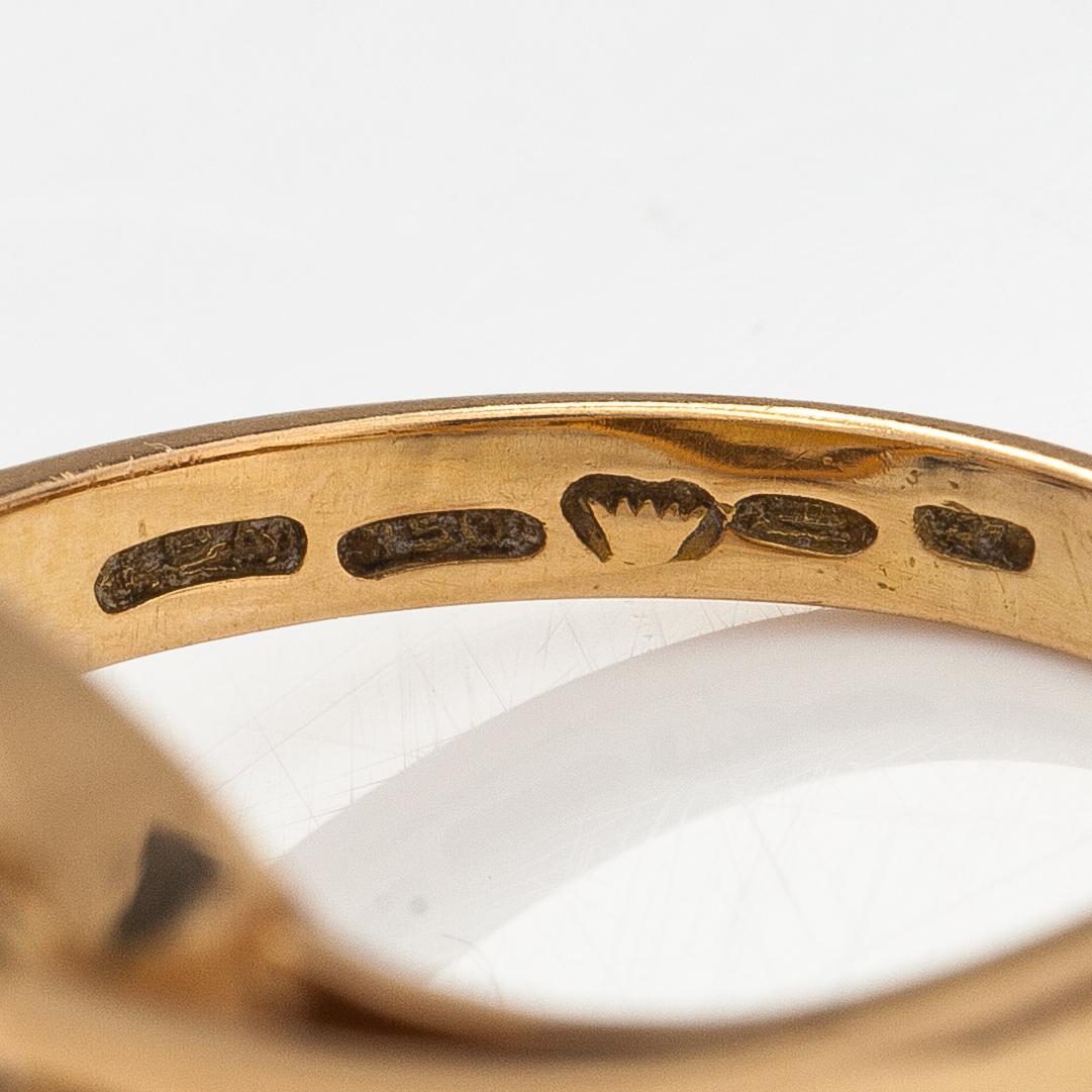 An 18K gold ring with a citrine. E.P. Alholinna, Helsinki 1957.
