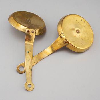 Two 18th century brass candlesticks.