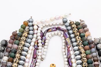 LYNGGAARD, 9 neclaces and clasp 18K gold, original cases, 1 case damaged, lengths approx 40-46 cm.