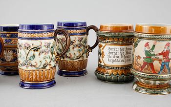 A set of eight majolica mugs from Rörstrand, around the turn of the century 1900.