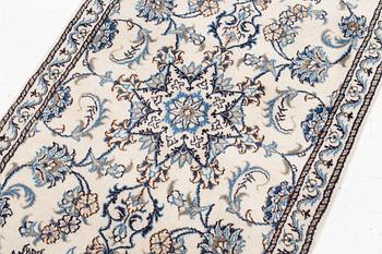 A runner carpet, Nain, ca. 299 x 76 cm.