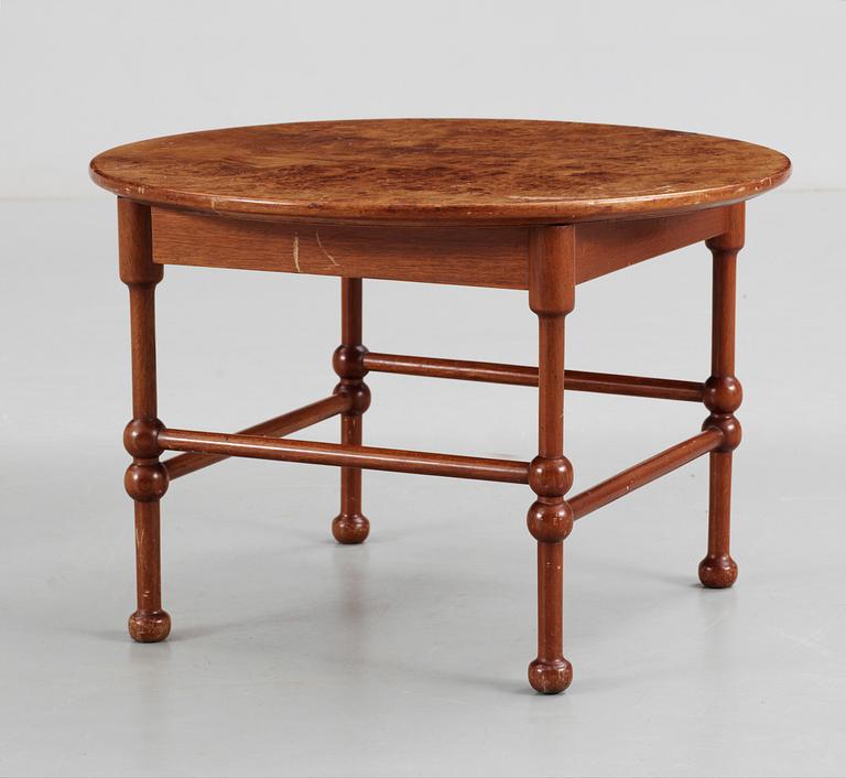 A Josef Frank mahogany and burrwood table, Svenskt Tenn, model 1028.