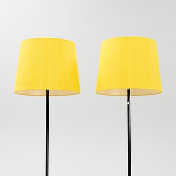 A pair of black metal floorlights, Luxus, Vittsjö.