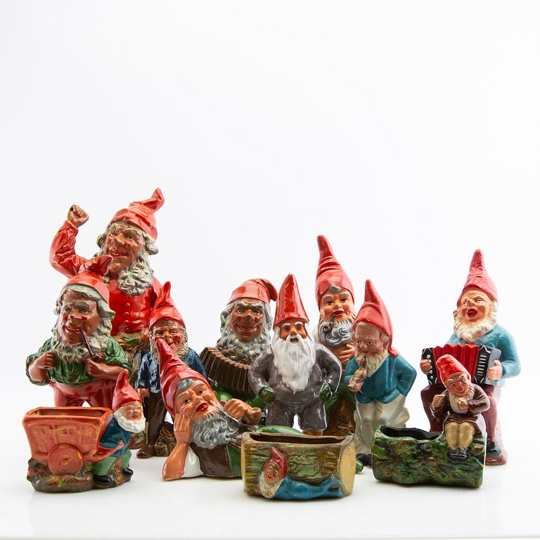 A collection of gnomes 12 pcs mid/late 20th century mostly painted terracotta.