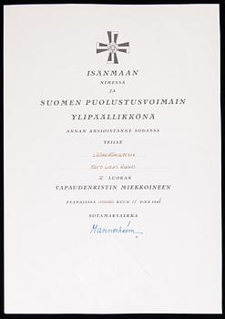 A 40 piece set of Finnish medals, badges and deeds of transfer from II-WW.