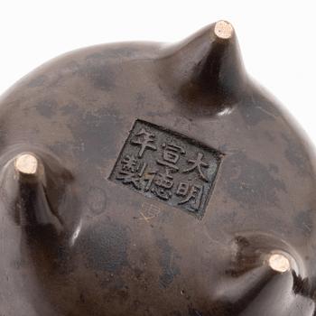 A Chinese tripod bronze censer, 20th century.