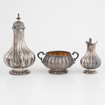 A three-piece silver coffee service by Gustaf Möllenborg, Stockholm, Sweden, 1891.