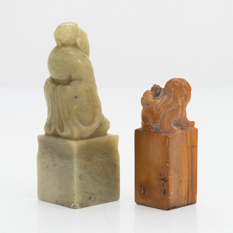 Two pieces of carved agalmatolite, sculpture and seal,one with stamp. China, mid-20th century.