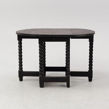 A painted gate-leg table, early 20th Century.