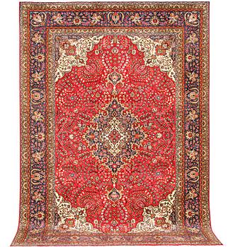 A Tabriz carpet, c 295 x 198 cm.