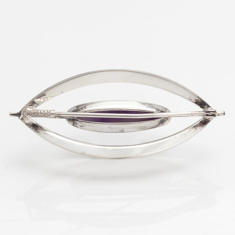 Elis Kauppi, A silver brooch/pendant with an amethyst. Kupittaan kulta, Turku 1961.