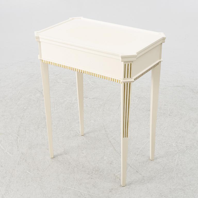 A Gustavian style side table, early 20th century.