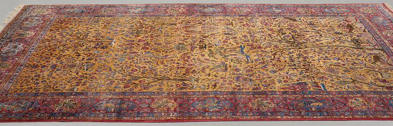 A carpet, a semi-antique silk Kashan figural, ca 309-310 x 204,5-207 cm.