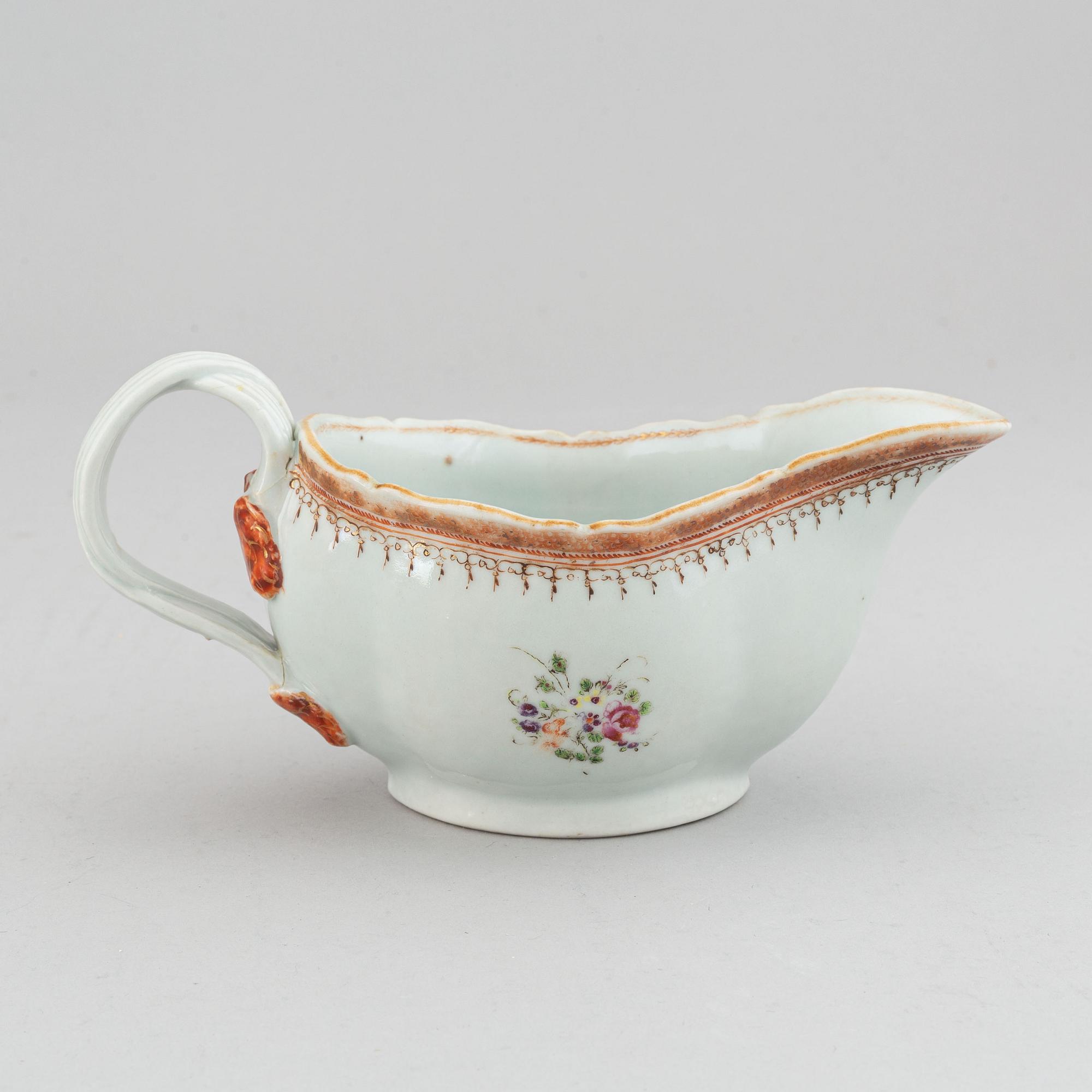 Two famille rose serving dishes and a sauce boat, Qing dynasty, Qianlong (1736-95).