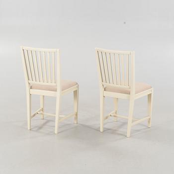 Four chairs and a dining table, probably Karl Andersson & Söner, second half of the 20th century.