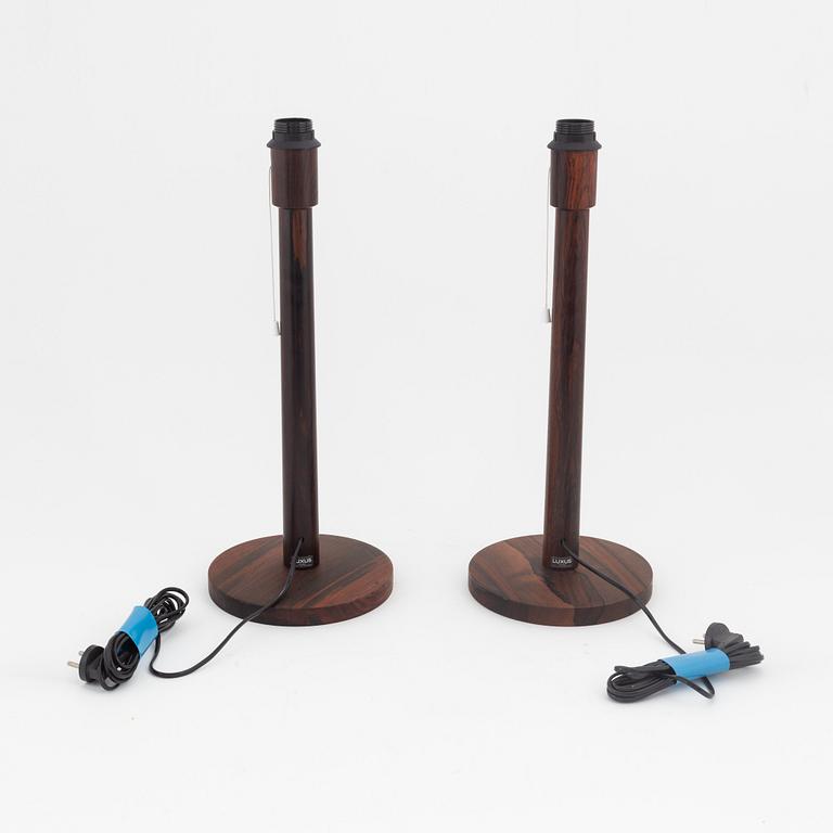 Uno & Östen Kristiansson, a pair of rosewood table lights, Luxus, Vittsjö, 1960's.