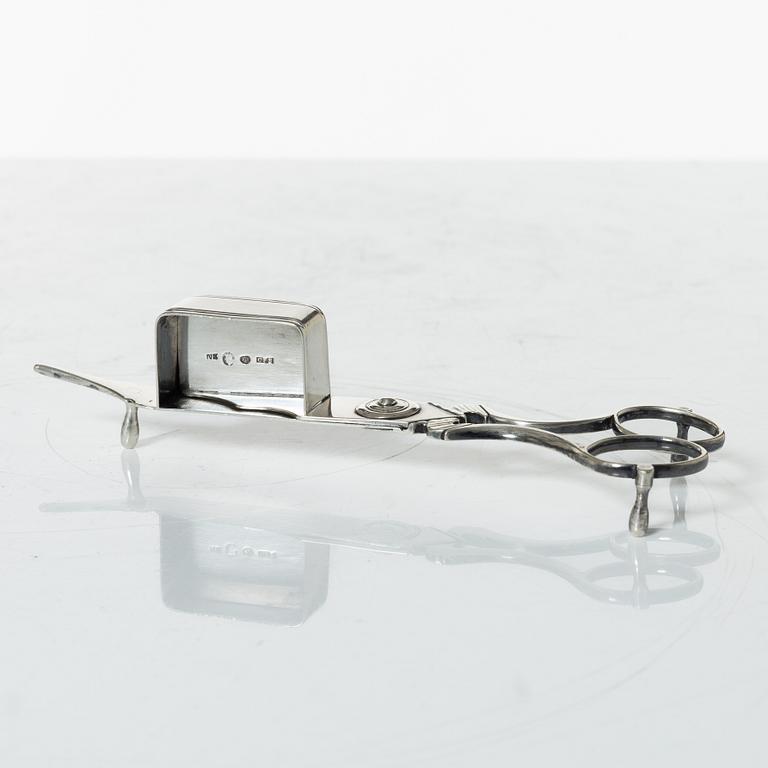 A Swedish Empire silver candle snuffer and tray, Stockholm 1818-1819.