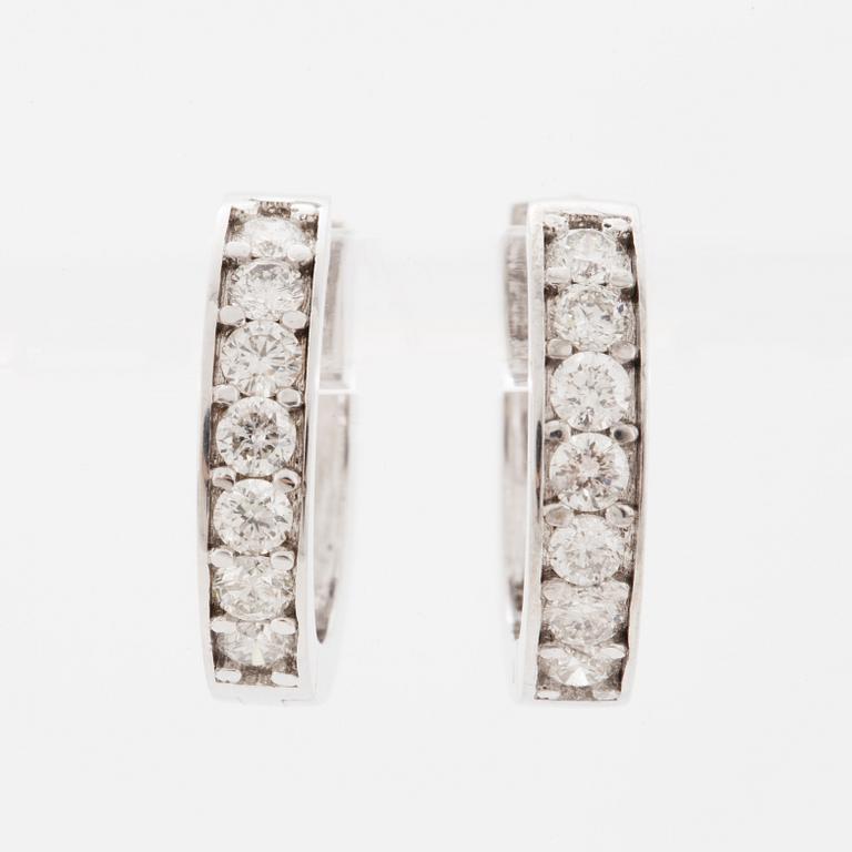 Brilliant-cut diamond  hoop earrings.