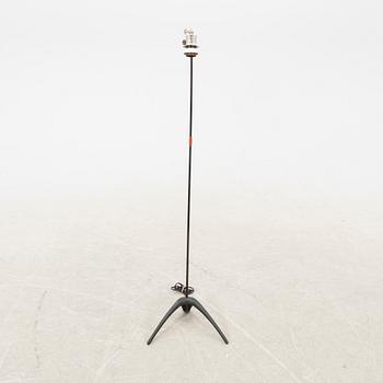 A metal floor lamp from the later part of the 20th century.