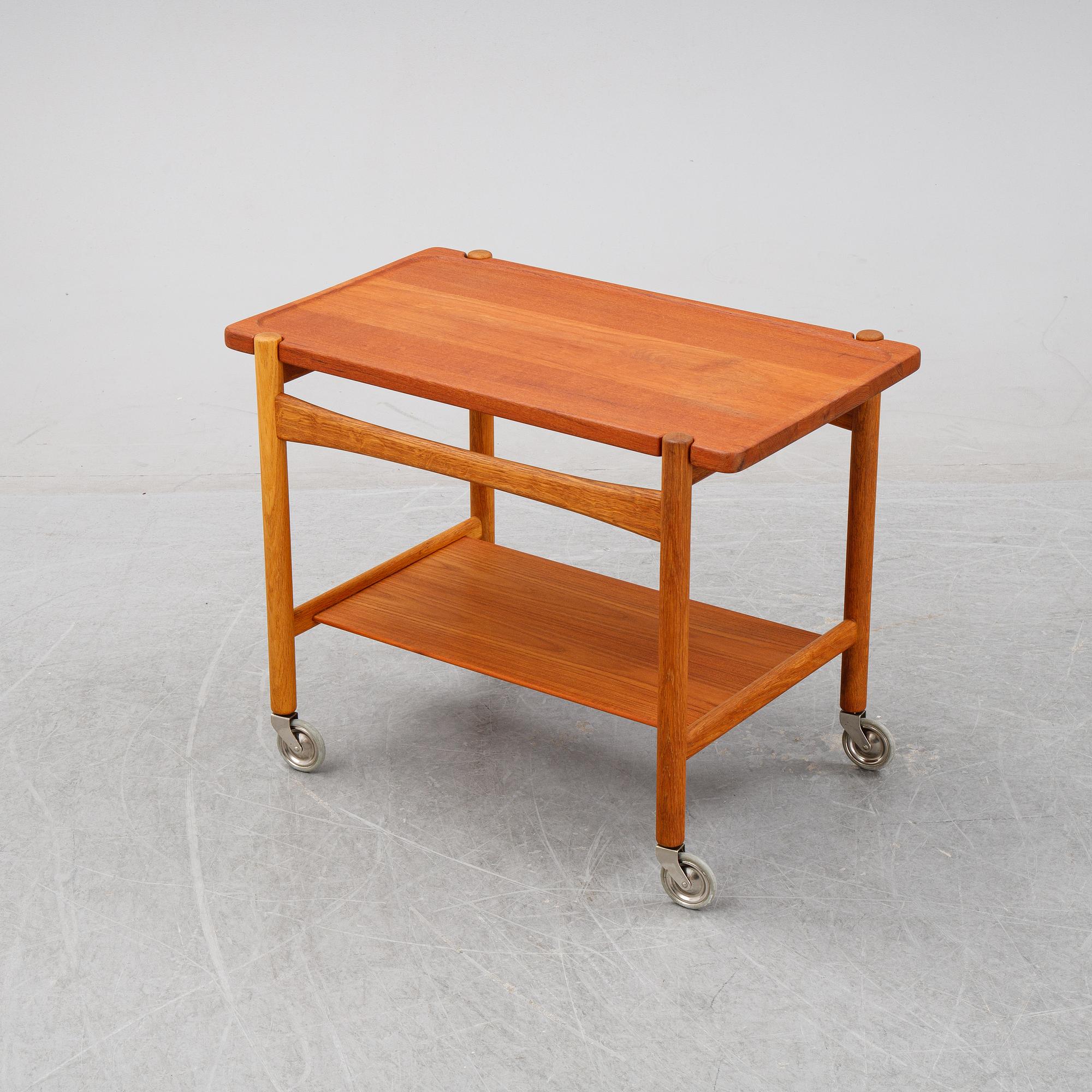 Hans J Wegner, a teak serving trolley, for för Andreas Tuck, Denmark, mid 20th century.