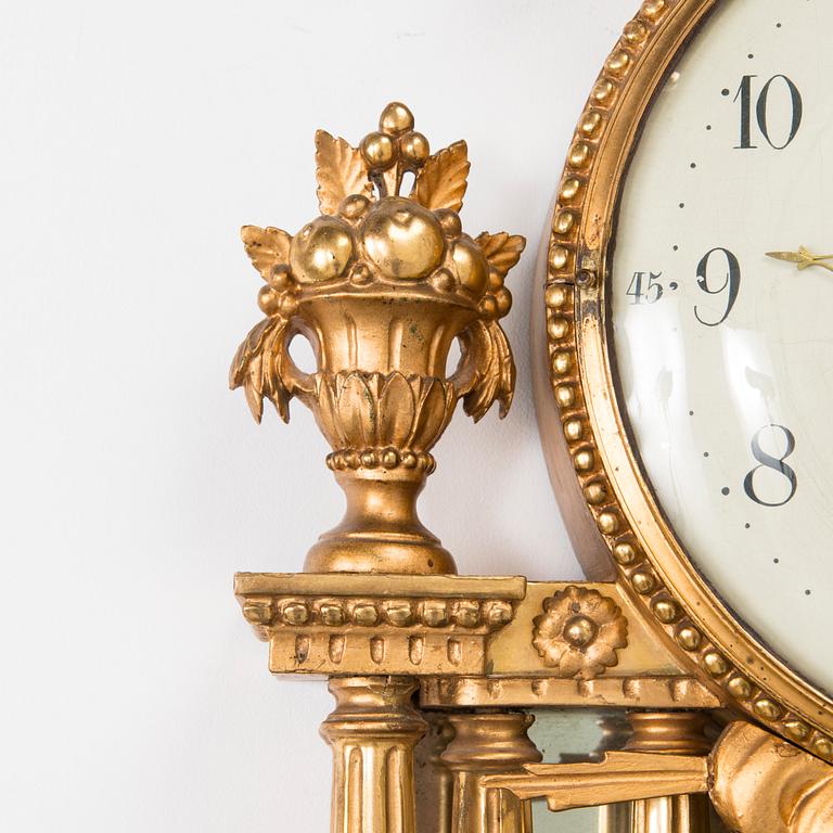 A late gustavian wall clock by Jacob Kock (clockmaker in Stockholm 1762-1803).