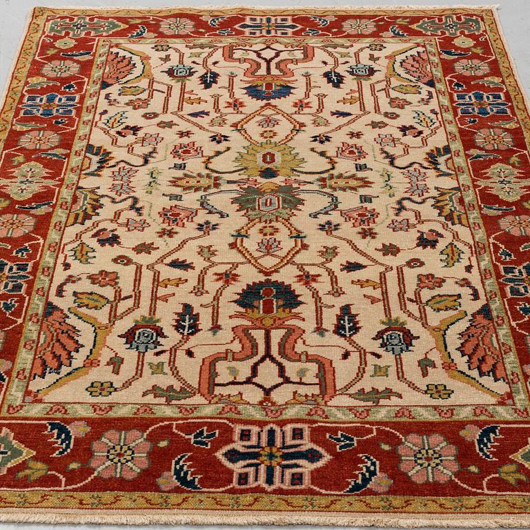 A RUG, Ushak design, ca 184 x 123 cm.