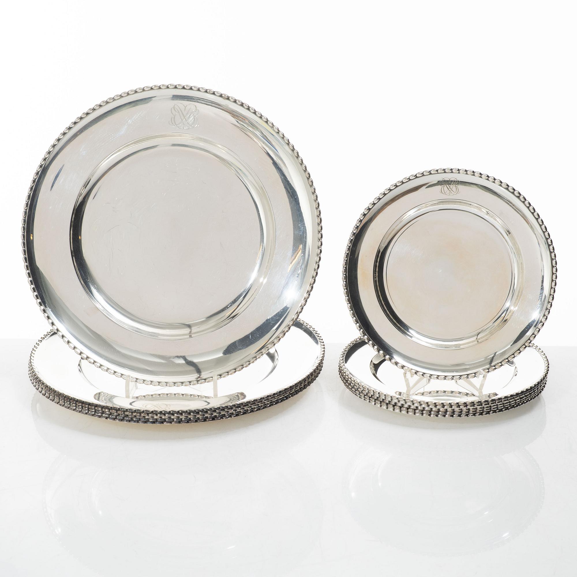 12 plates and 12 side plates, silver, marks of GAB and Edlund's silverware factory, Stockholm 1946 and 1974.