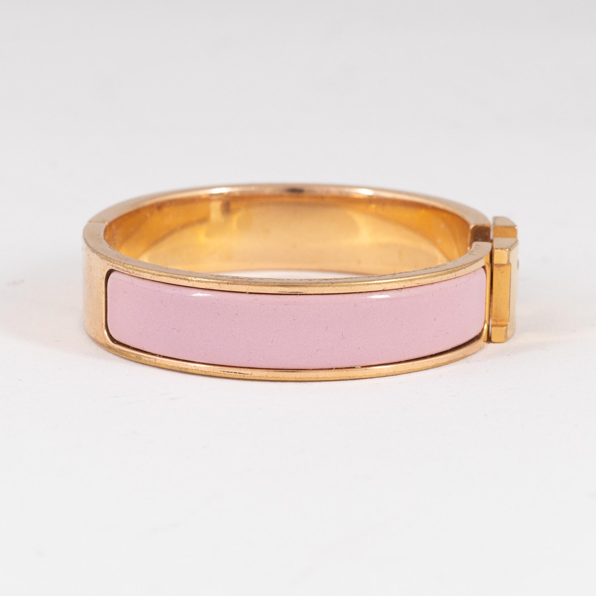 Hermès, a 'Clic H PM' bracelet.