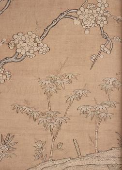 A bolt of creme coloured silk fabric, a framed textile and two embroidered silk panels, Qing dynasty.