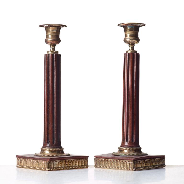 A pair of late Gustavian candlesticks.