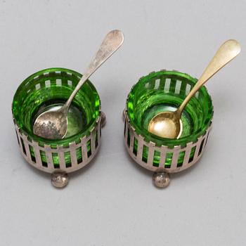 a pair of silver and galss salt cellars by CG Hallberg 1898.