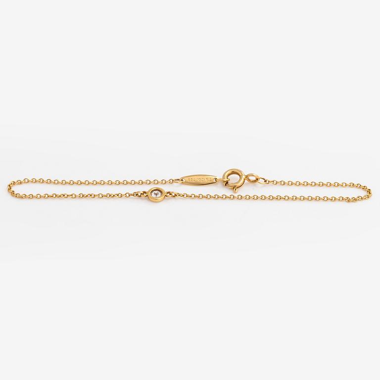 Tiffany & Co, Elsa Peretti, armband, "Diamonds by the Yard", 18K guld med en diamant ca 0.08 ct.
